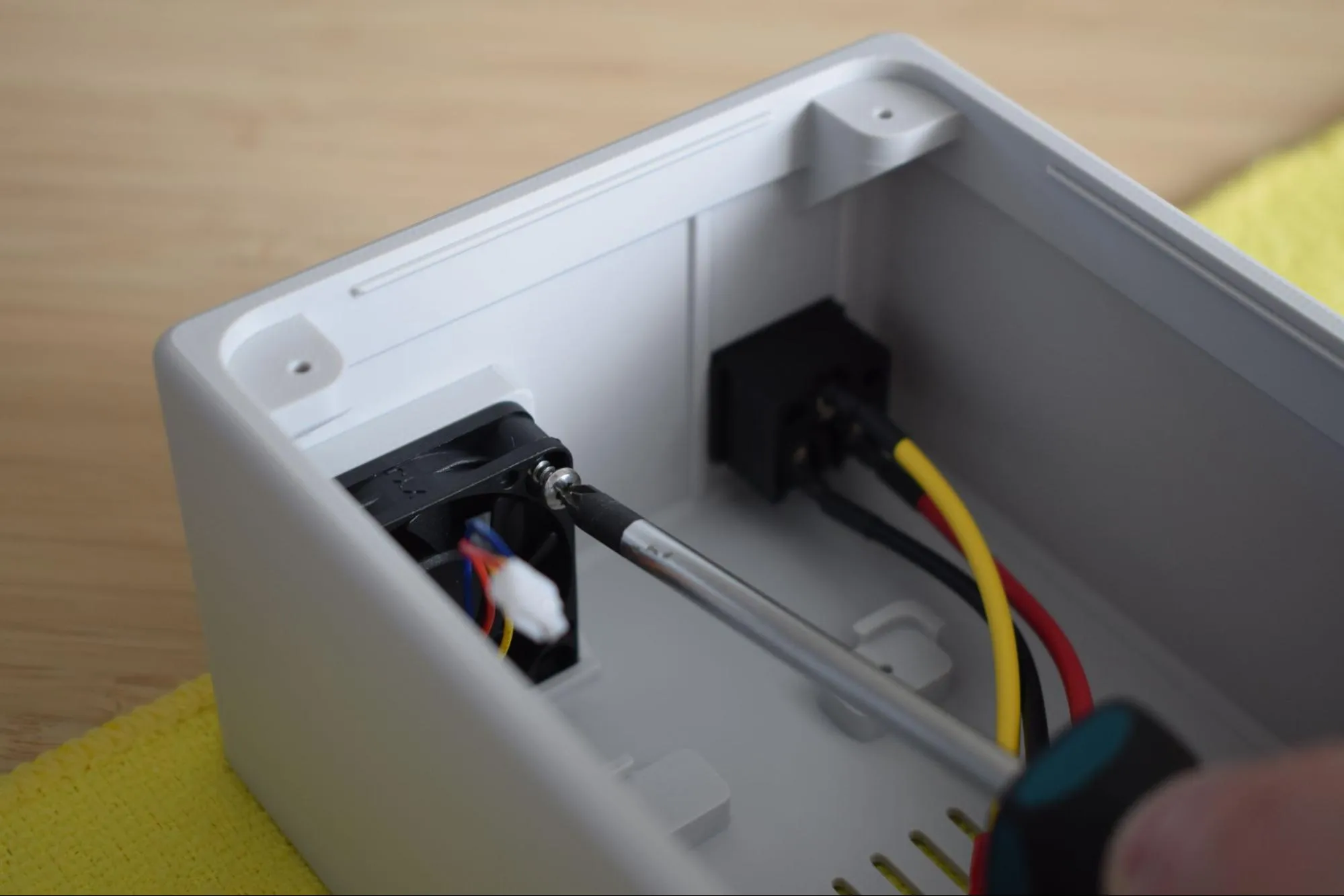 Secure fan with screw