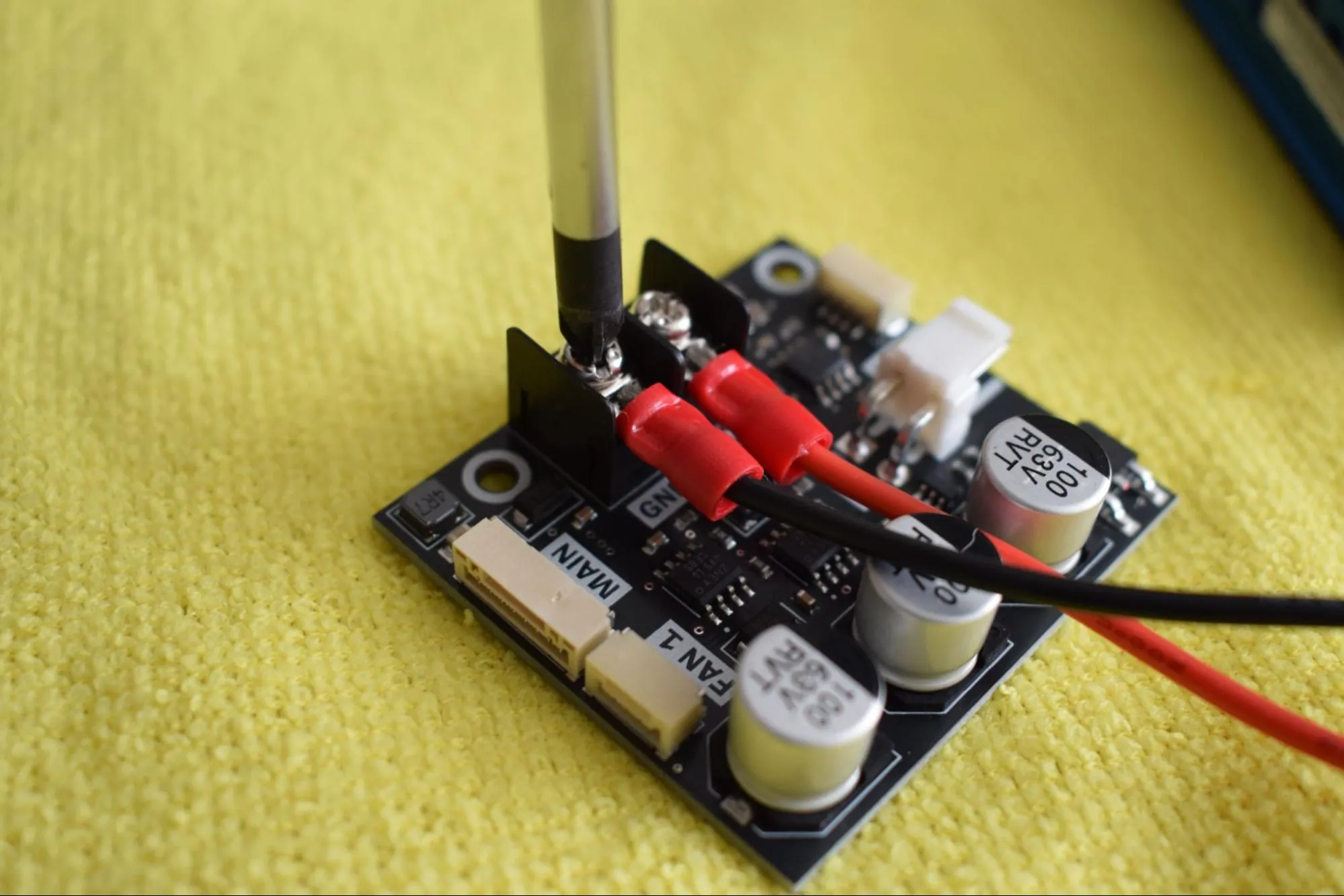 Black wire into GND terminal