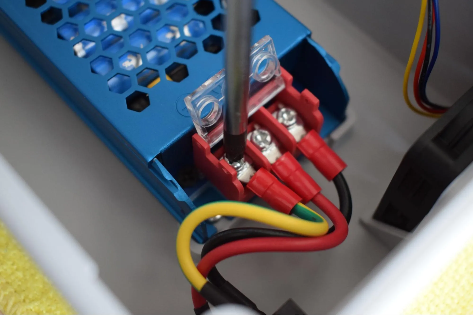 Tighten terminal screws
