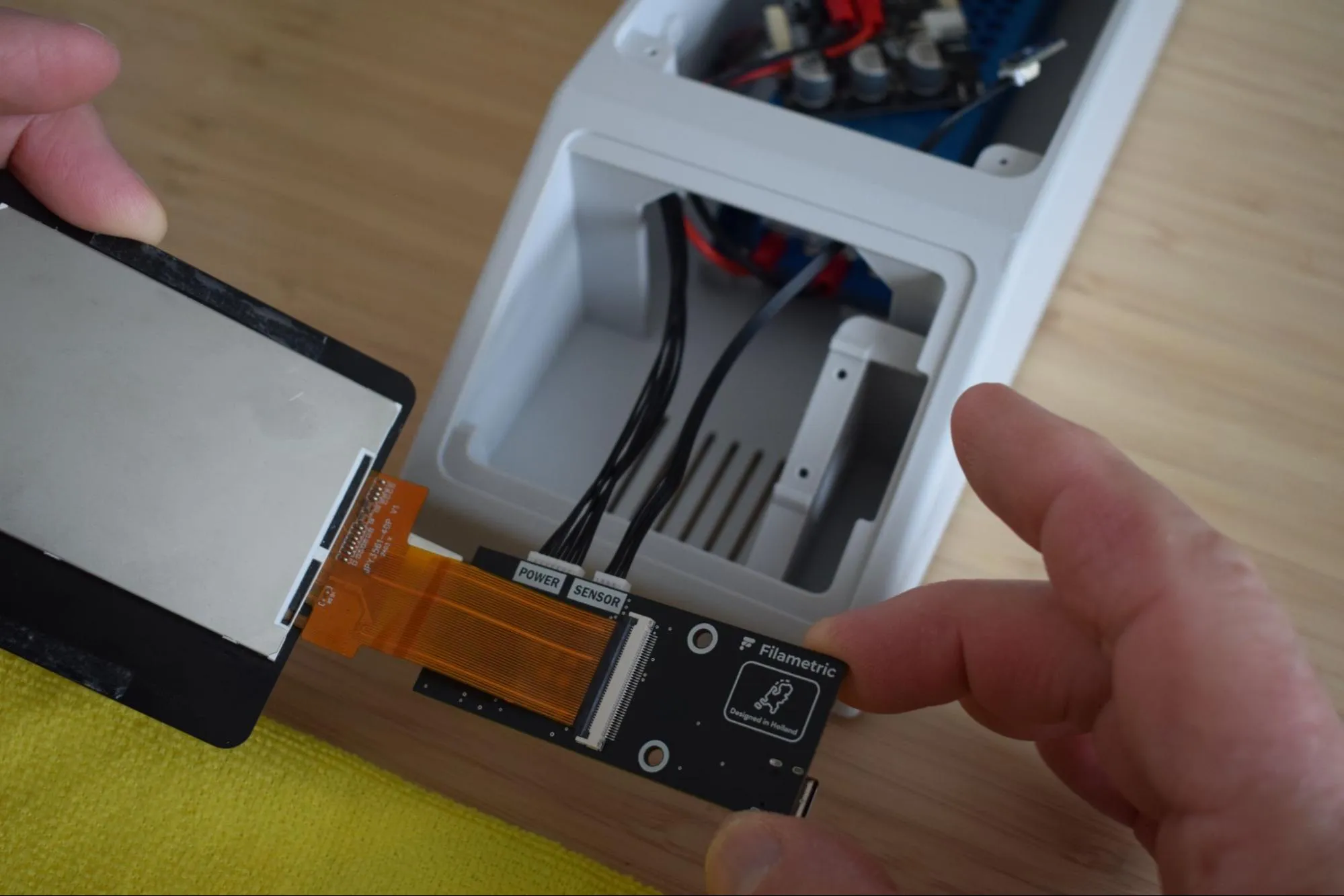 Hold display through opening