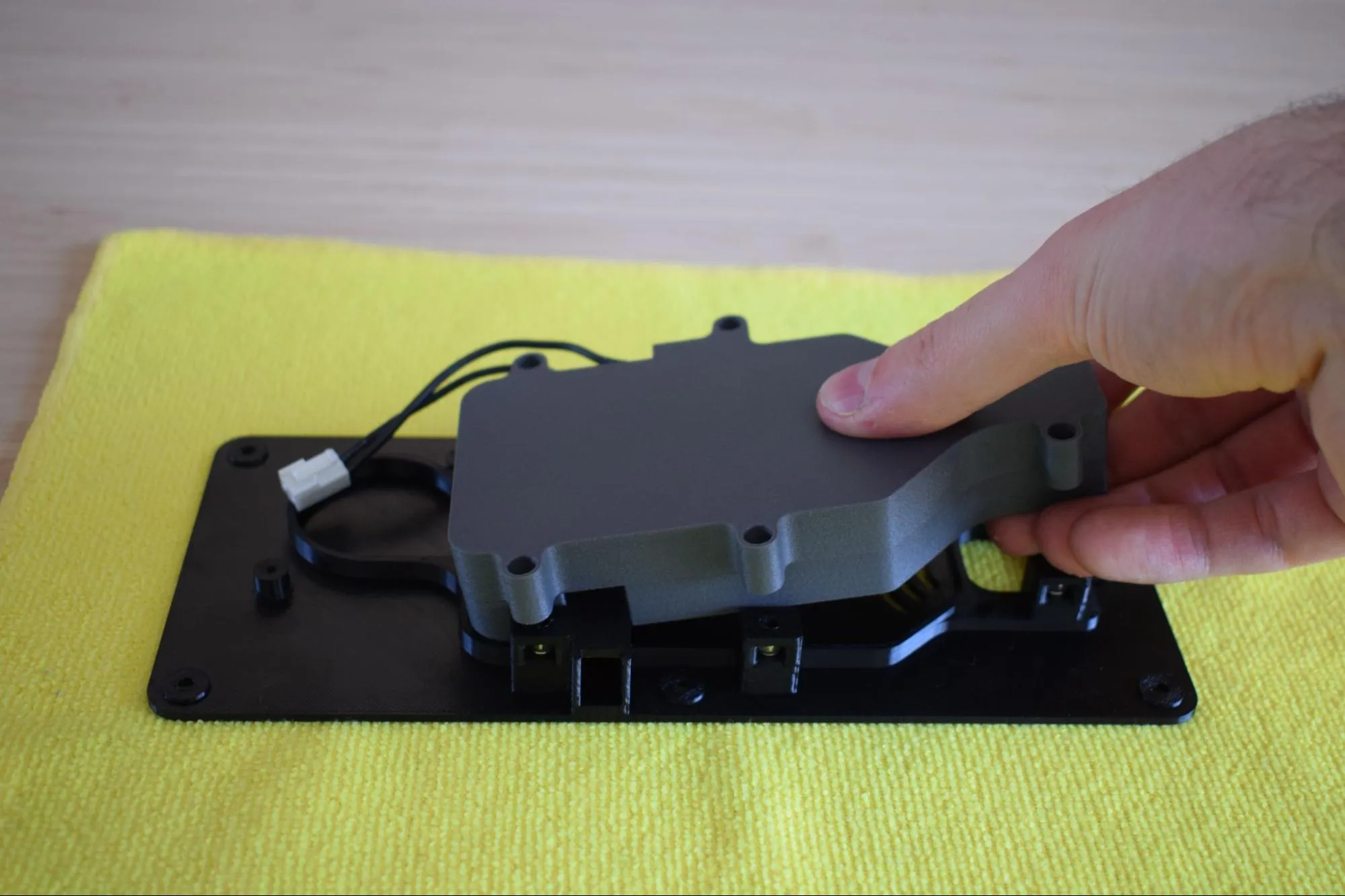 Place assembly on baseplate